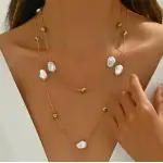 Elegante collar doble colgante con perlas  imitación para lucir radiante.
